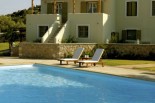 Luxury villas in Greece - Xenon Estate Althea living room spacious veranda leading to the swimming pool