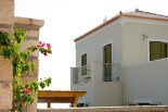 Luxury villas in Greece - Xenon Estate villa Astraea outdoors pergola and top floor master bedroom